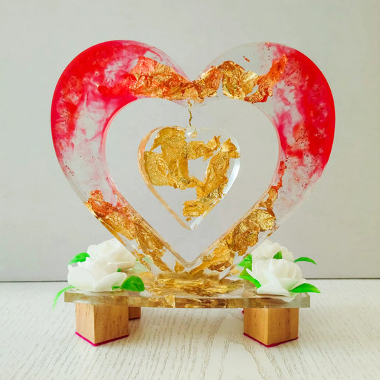 A stunning one-of-a-kind resin art sculpture in the shape of a heart